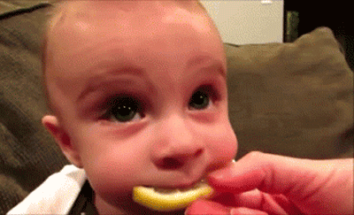 funny-pictures-baby-eating-lemon-animated-gif